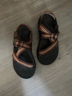 Chaco Brown and Black Strapped Sandals with Orange Accent